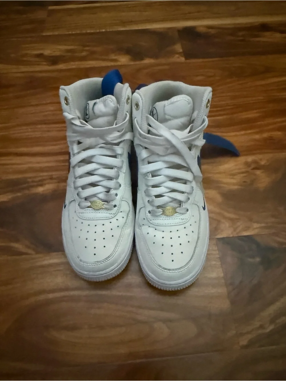Nike White High-Top Sneakers with Blue Swoosh and Strap